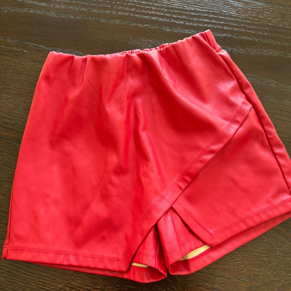 Red leather shorts